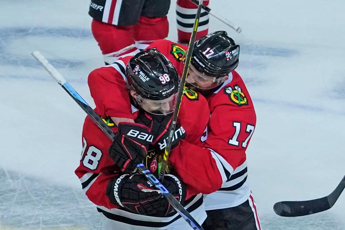 Connor Bedard and Nick Foligno 