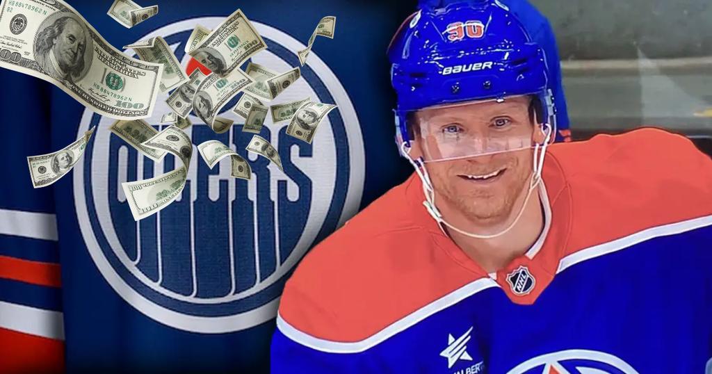 Corey Perry dans l'uniforme des Oilers avec une pluie de billets