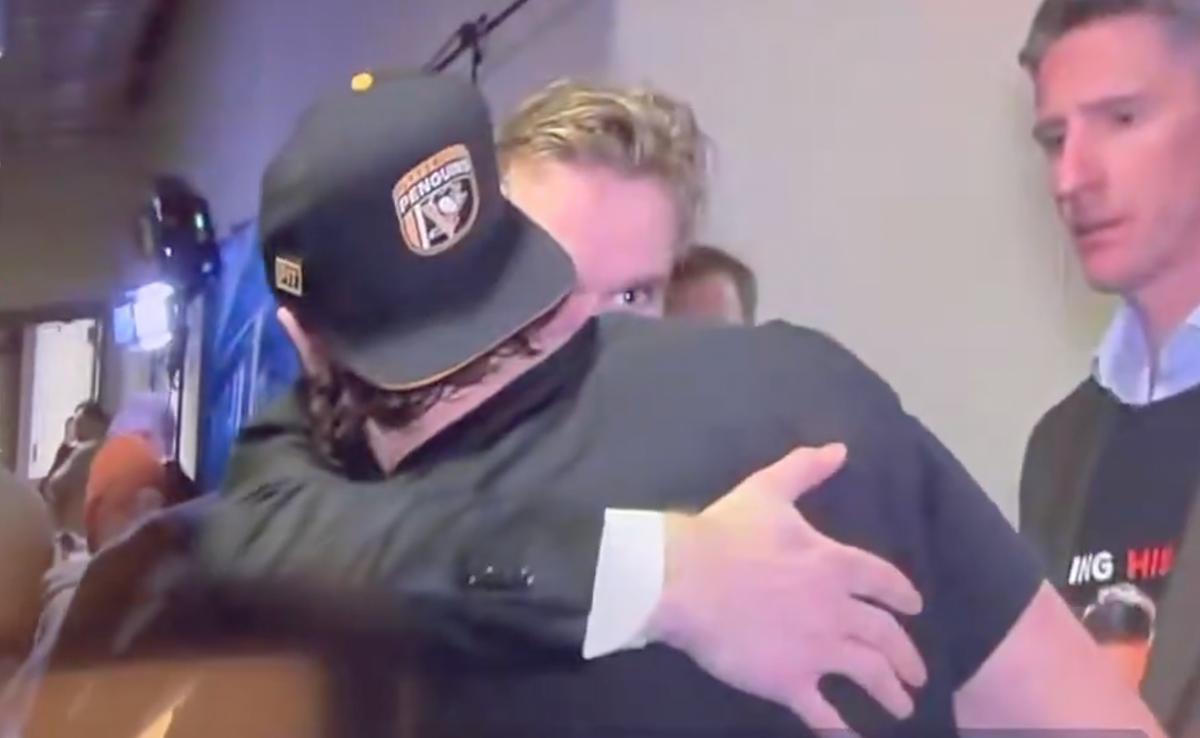 Connor McDavid hugging Stuart Skinner.
