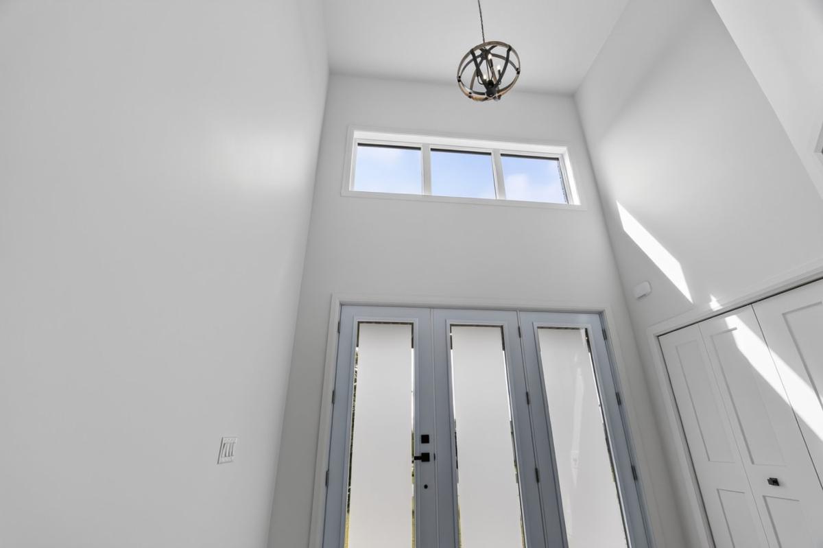 Perspective du hall vers les espaces de vie