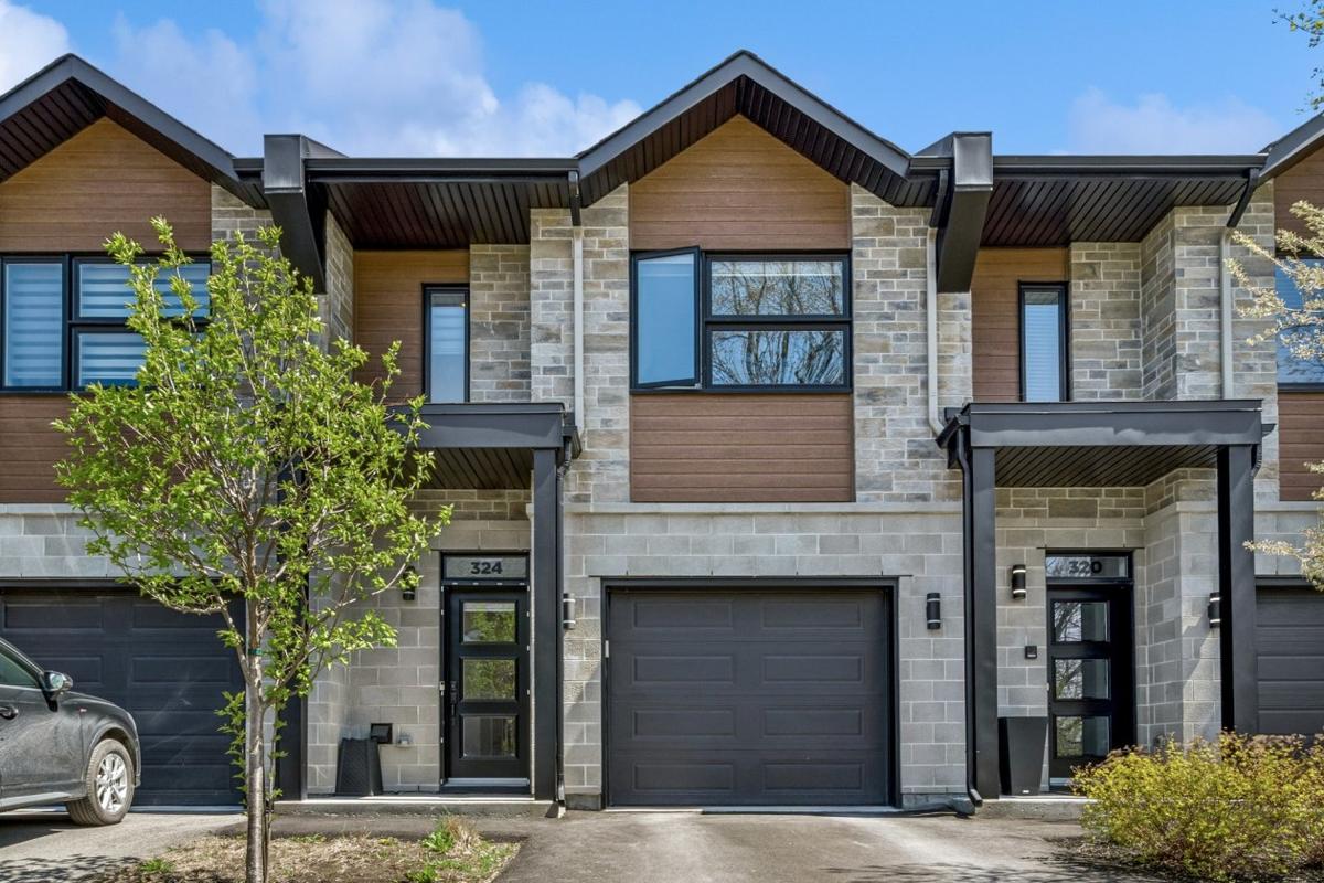 Lumineuse et moderne : une maison à étages clé en main à deux pas de la Baie Miller à Boisbriand