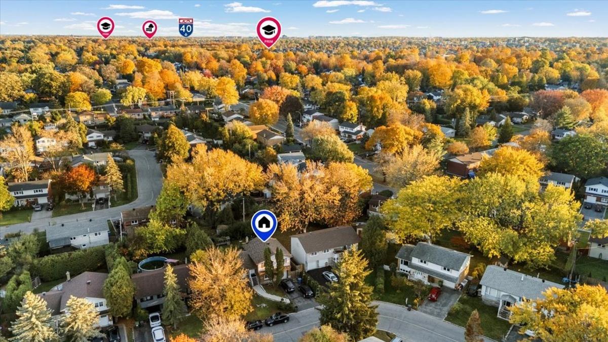 Vue aérienne de la propriété et de son environnement verdoyant