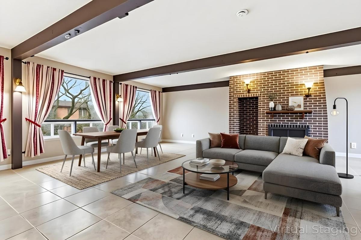 Salon avec foyer en brique