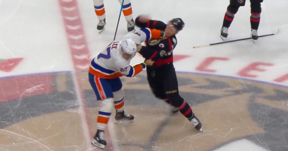 Brady Tkachuk and Anders Lee fighting 
