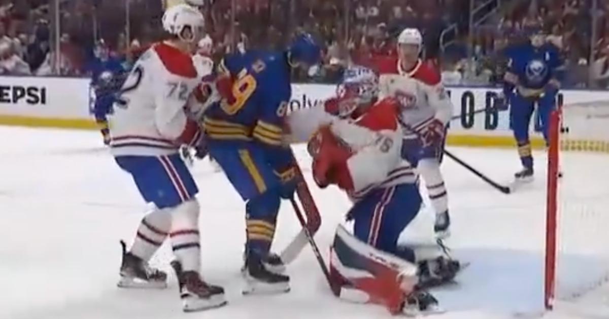 Jakub Dobeš punches Alex Tuch. 