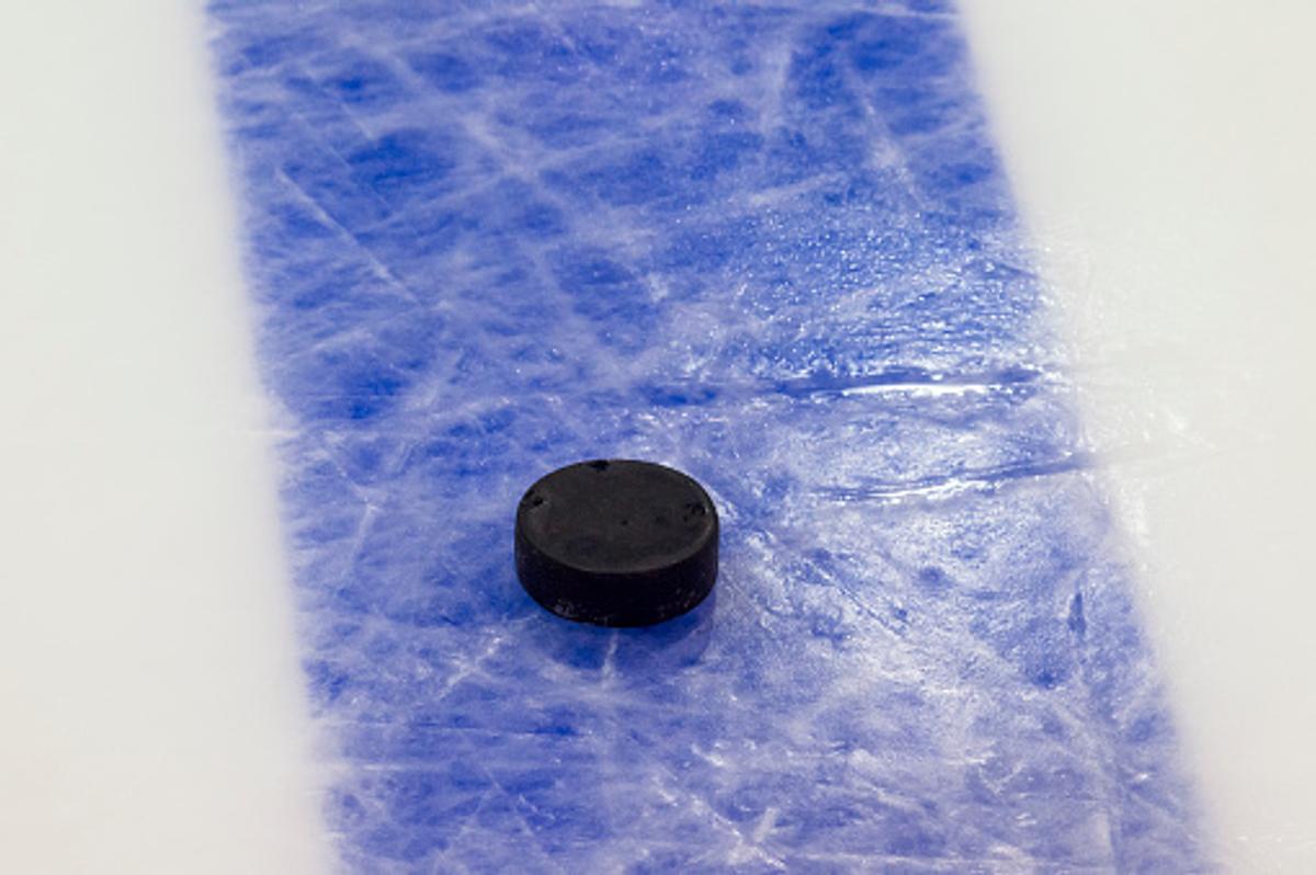 Puck at blue line. 