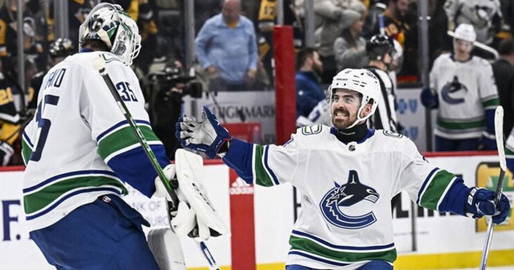 Thatcher Demko and Conor Garland