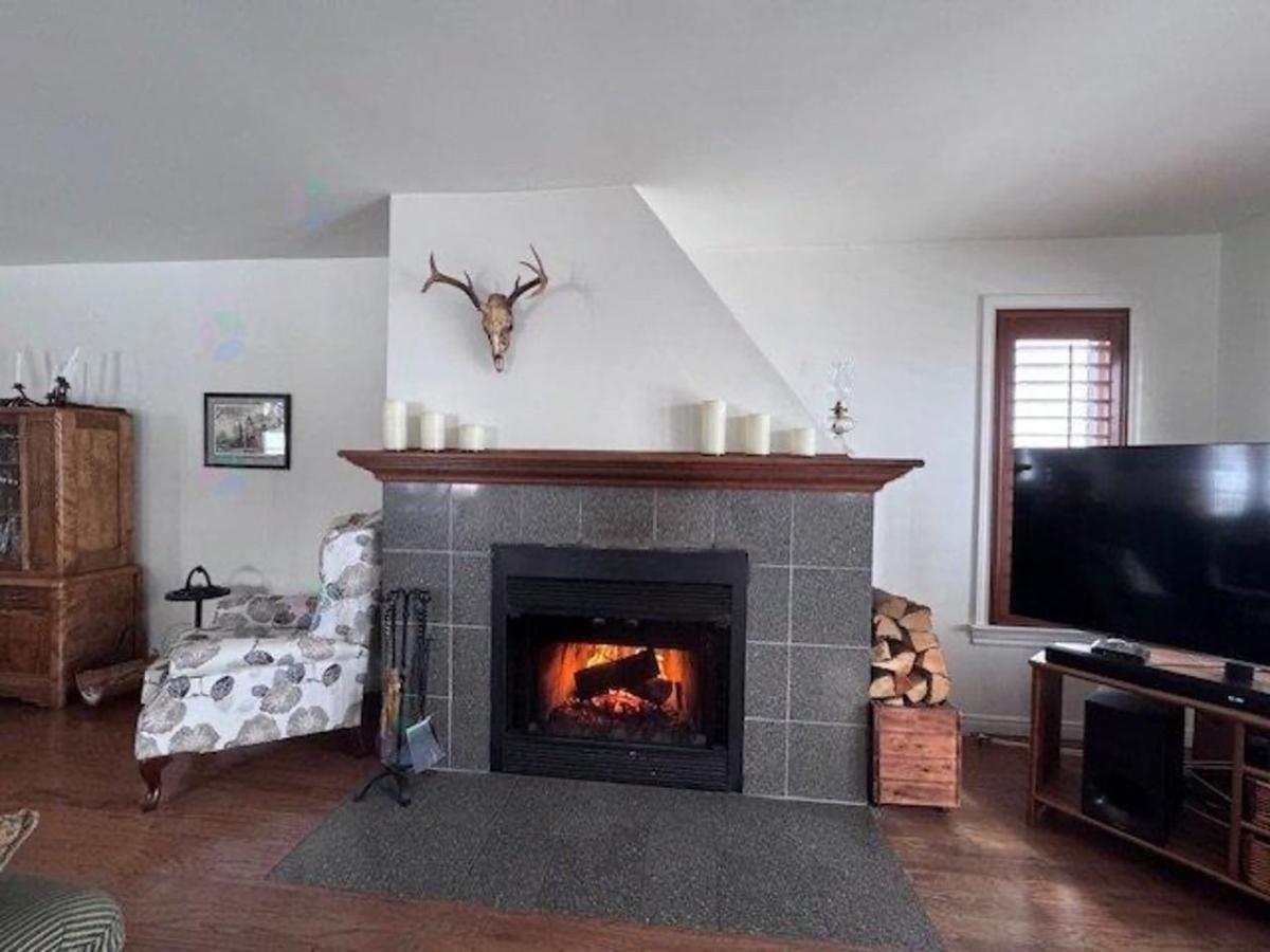 La chambre principale avec vue sur le lac
