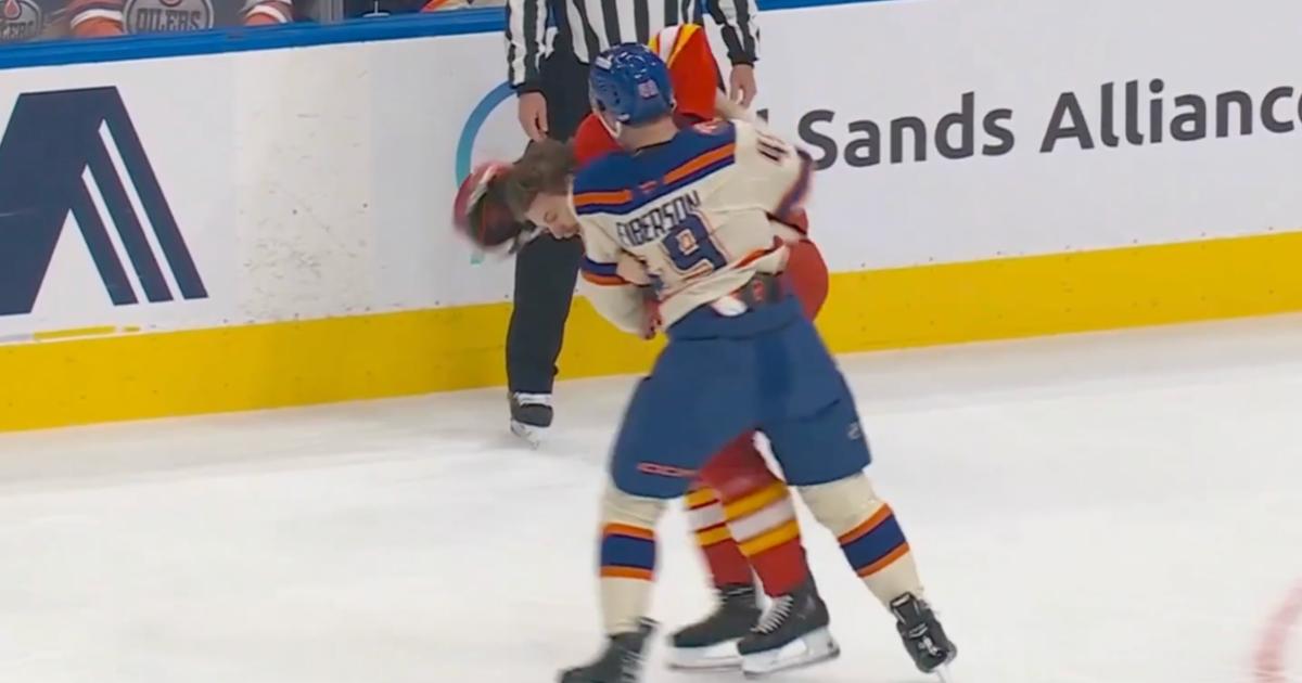 Ty Emberson and Brennan Othmann fighting. 