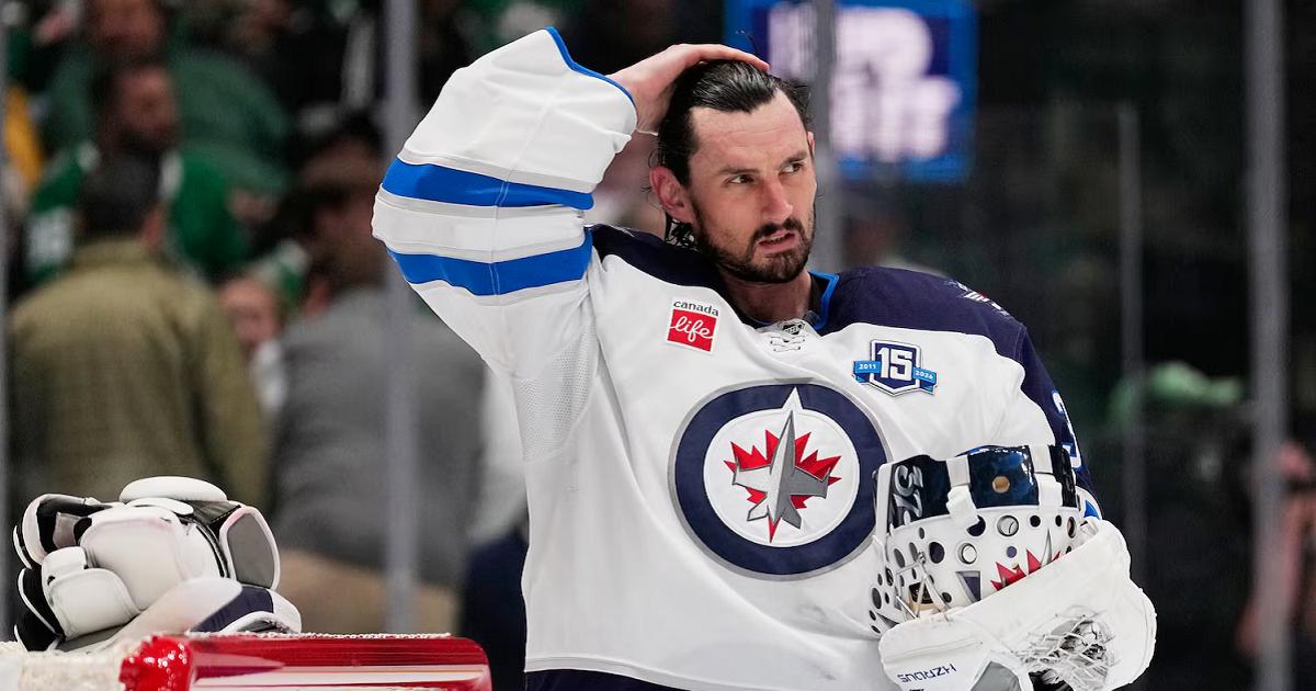Connor Hellebuyck-Tony Gutierrez-The Associated Press-