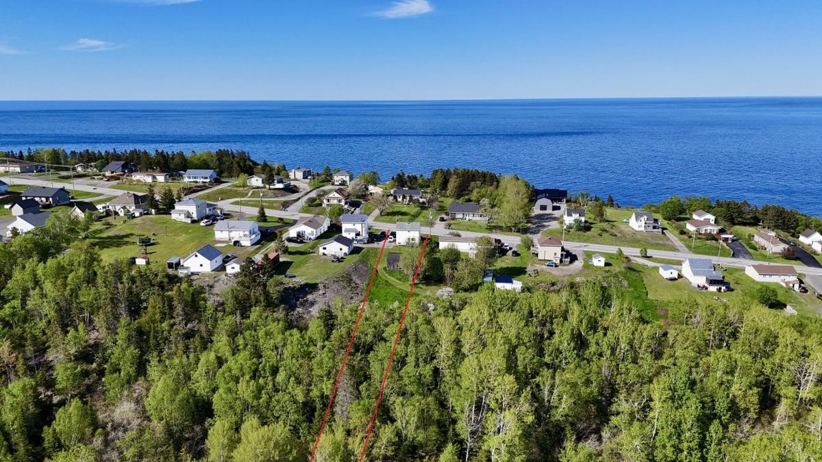 Vue aérienne de la propriété et de son environnement côtier