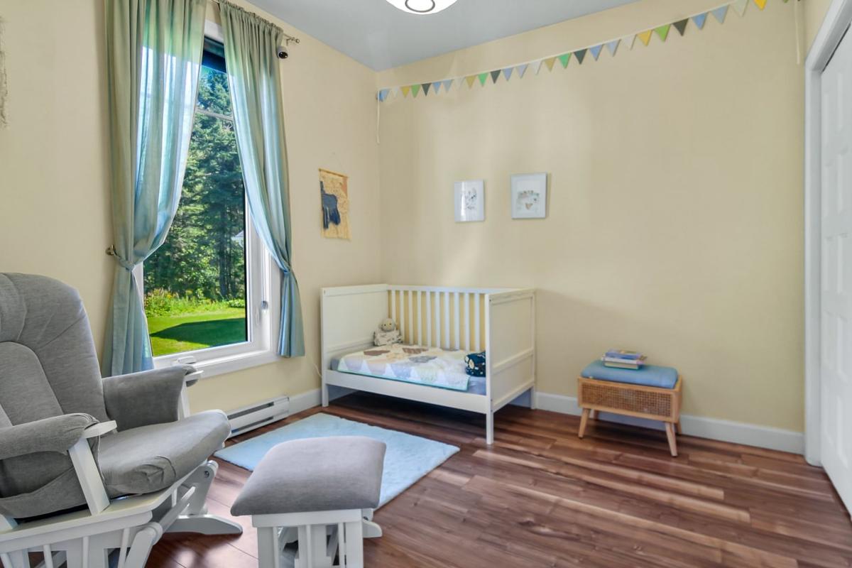 La chambre des maîtres sur son demi-étage