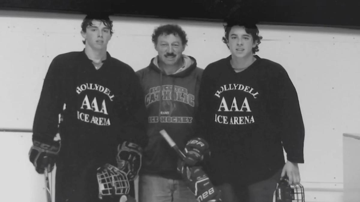 Johnny and Matthew Gaudreau, with their father