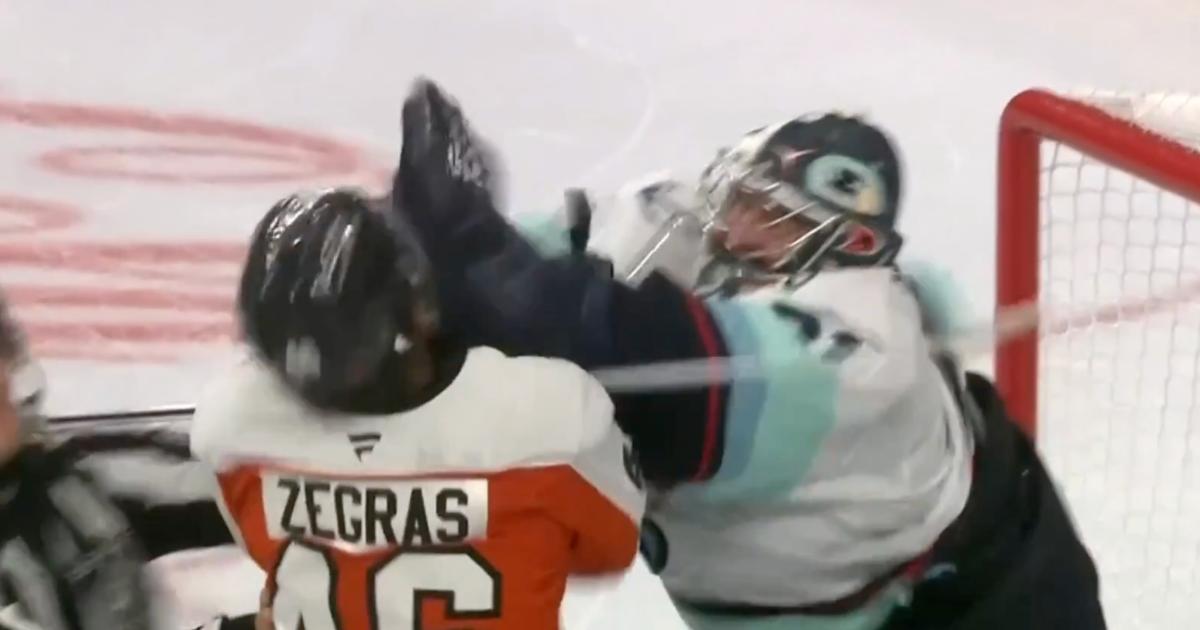 Philipp Grubauer fights Trevor Zegras 
