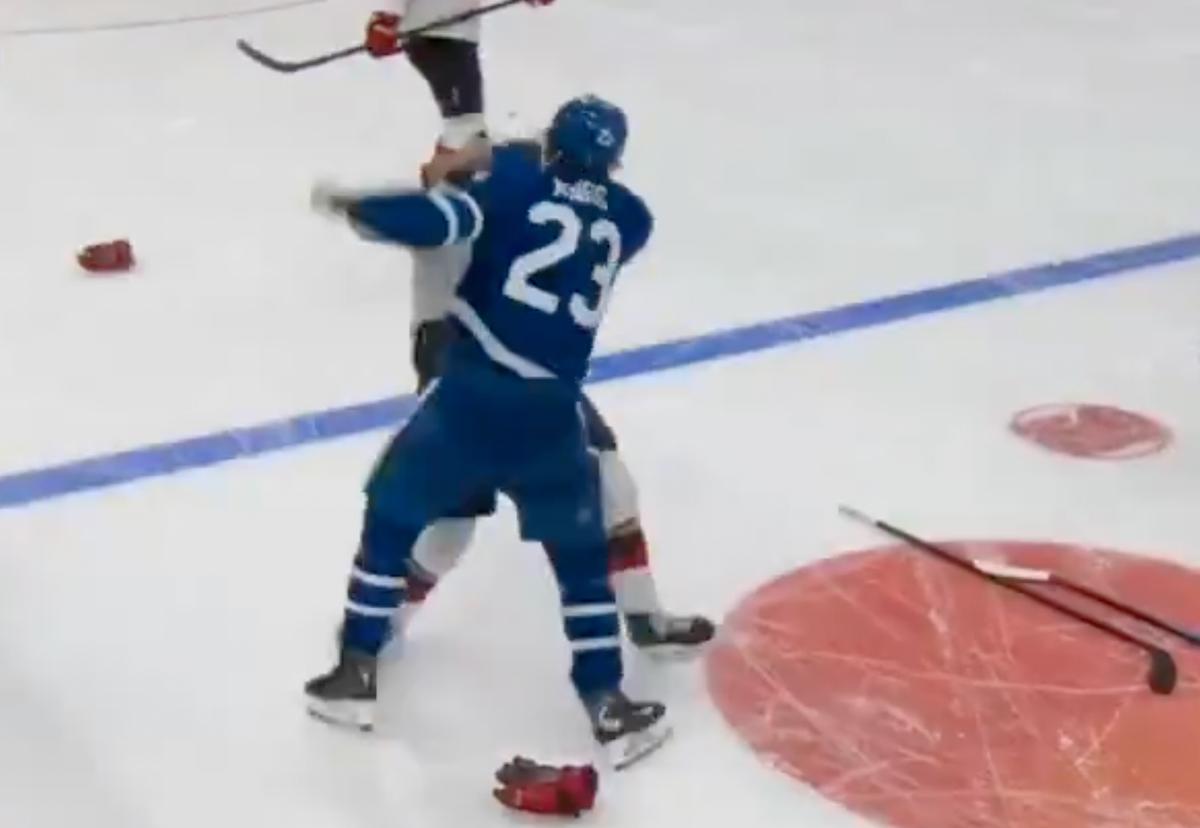 Matthew Knies and Nico Hischier fighting.