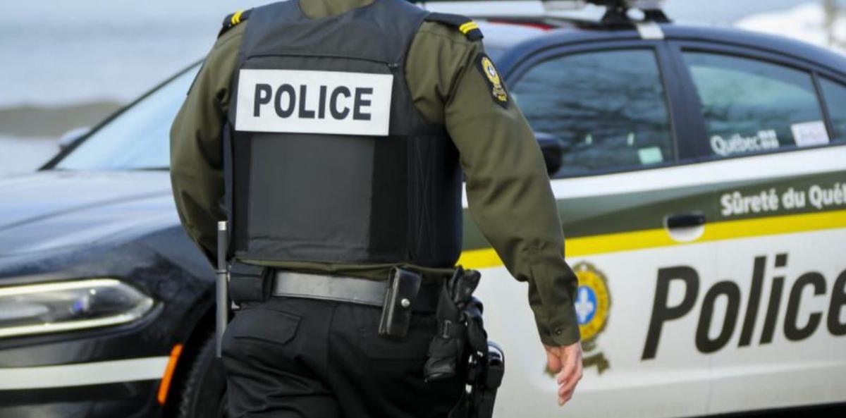 Policier et véhicule de la Sûreté du Québec