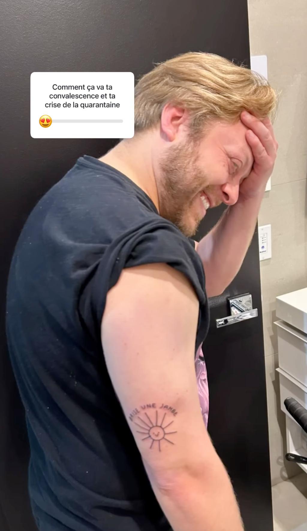 Guillaume Lambert présente son nouveau tatouage