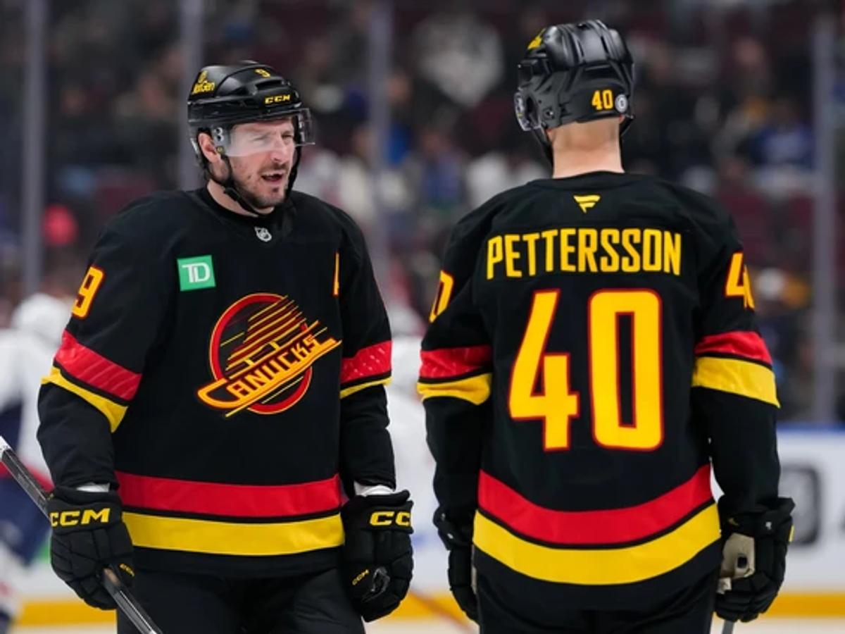 JT Miller and Elias Pettersson