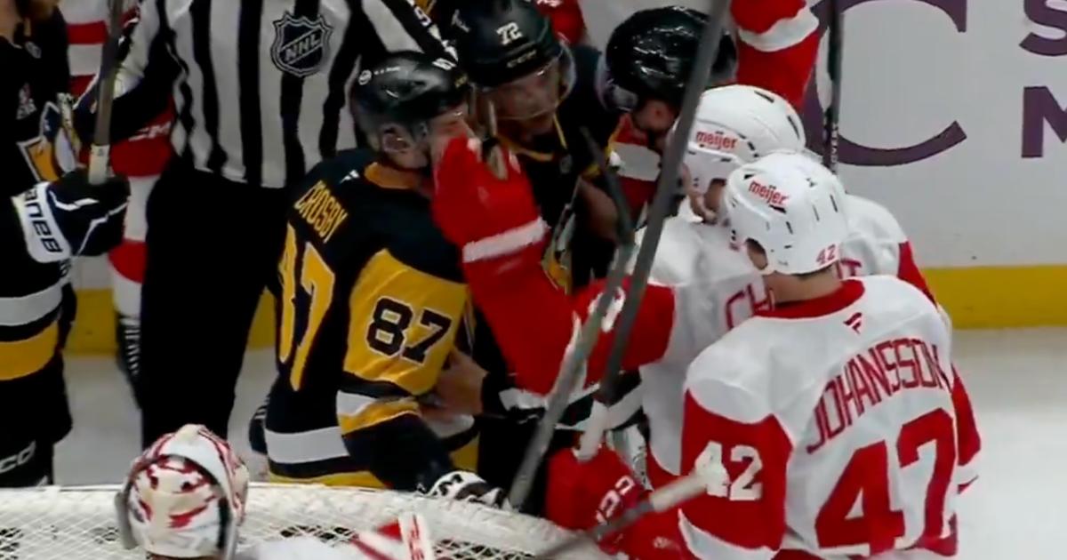 Sidney Crosby in the middle of a scrum against Detroit.
