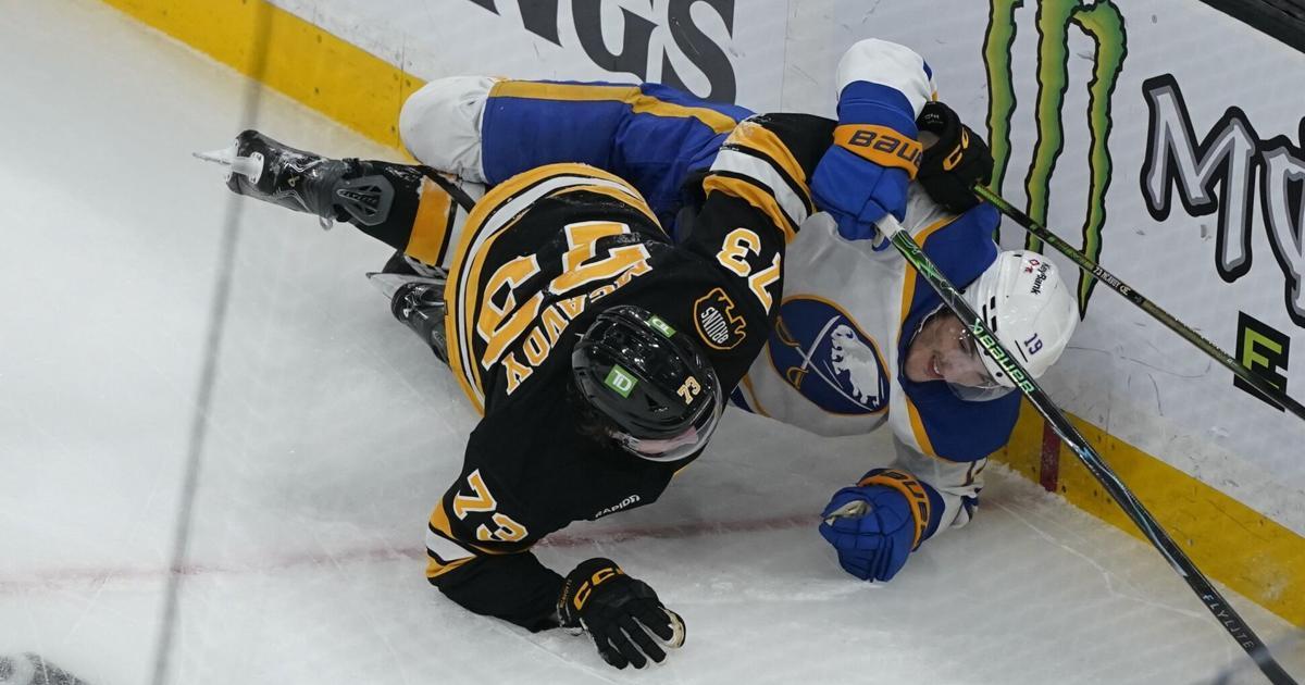 Charlie McAvoy and Zach Benson