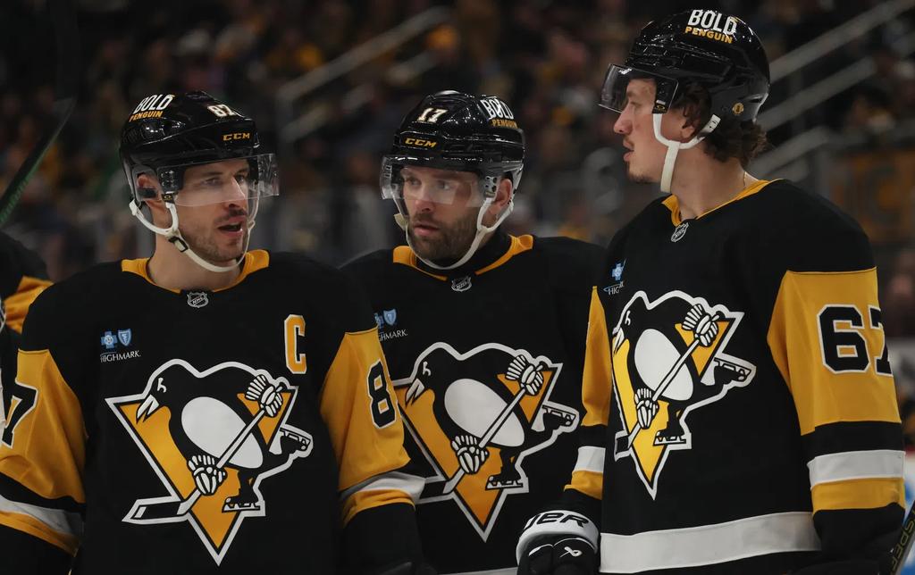 Les joueurs des Penguins en discussion