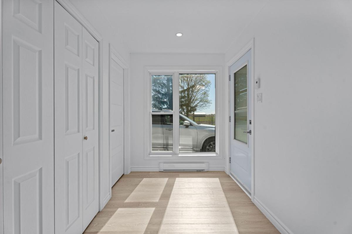 Perspective depuis le hall vers les espaces de vie