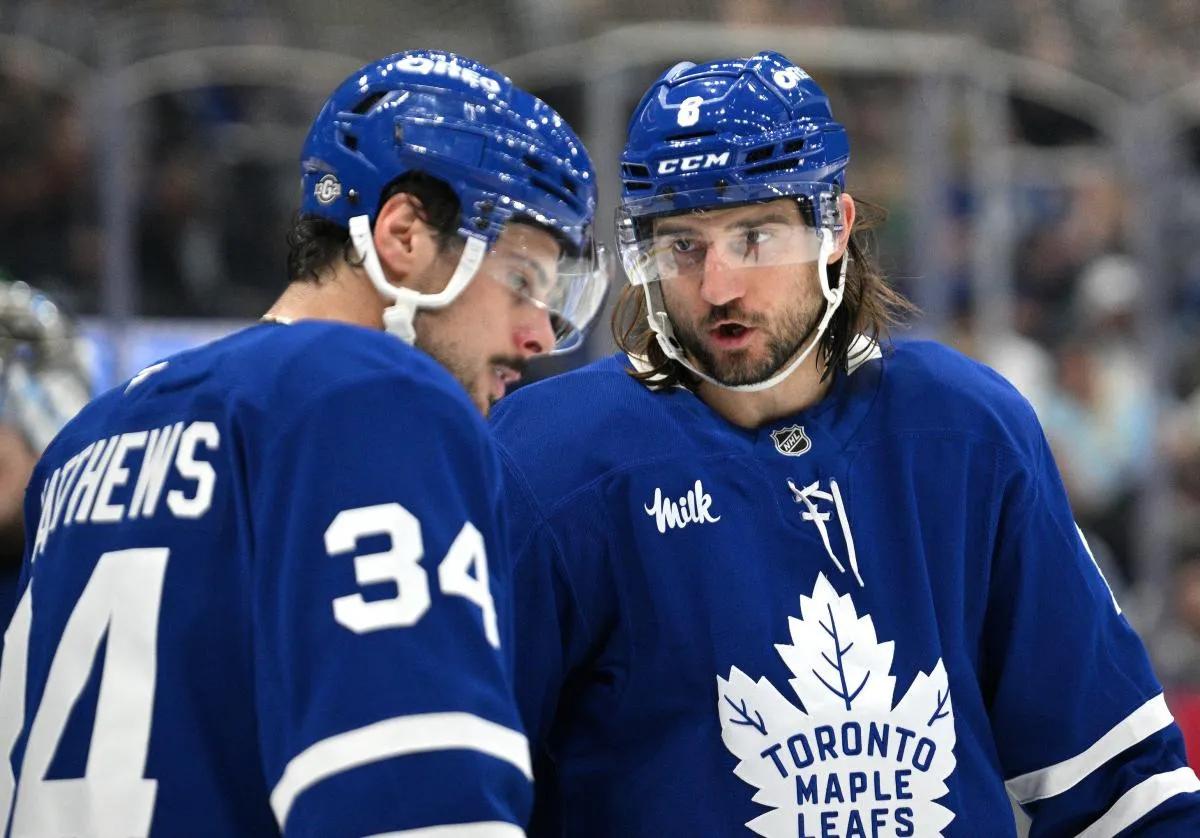 Auston Matthews and Chris Tanev