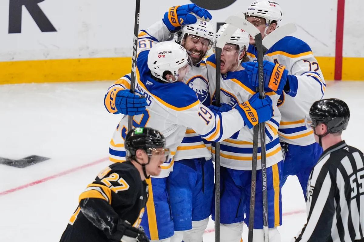 Alex Tuch and Sabres' teammates.