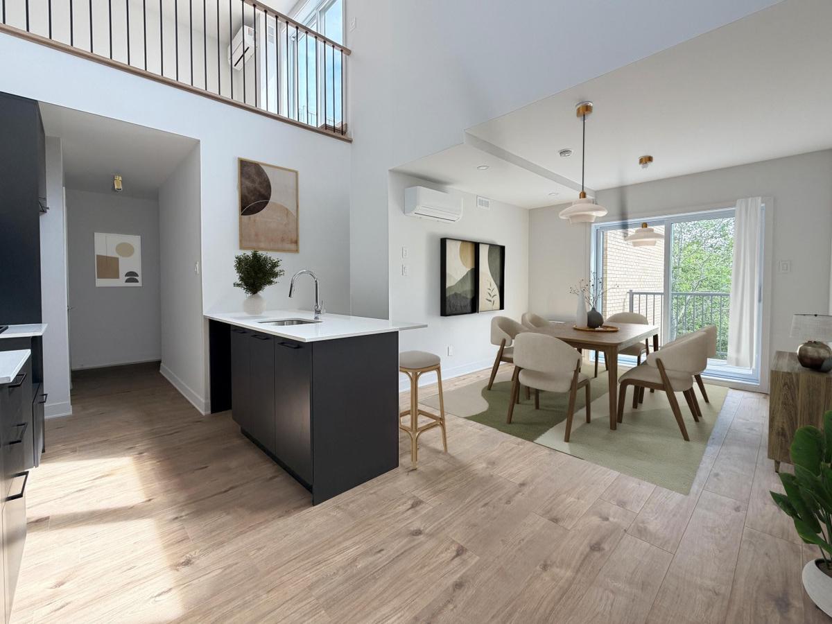 Cuisine contemporaine avec îlot en quartz