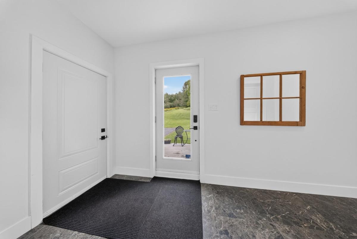 Le hall d'entrée de la maison